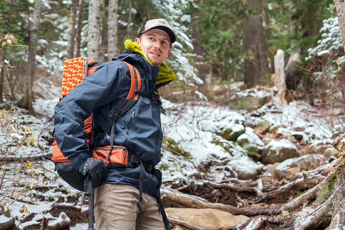 Hiking with backpack and trekking poles (wearing Arc'teryx Beta AR hardshell)